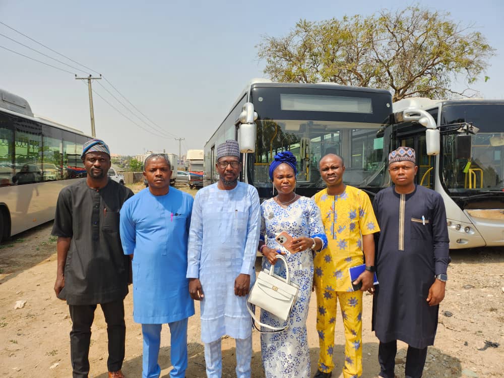 Transport stakeholders and I-Metro representatives during official fleet review.